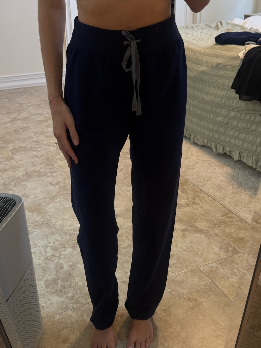 Navy blue FIGS scrub pants